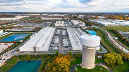 A modern industrial infrastructure development including large data centers, power supply, and logistics hub in Ohio.
